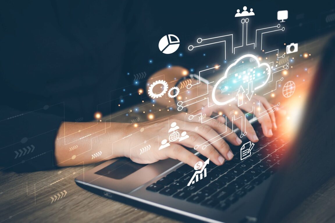 Cloud computing concept with hands on laptop